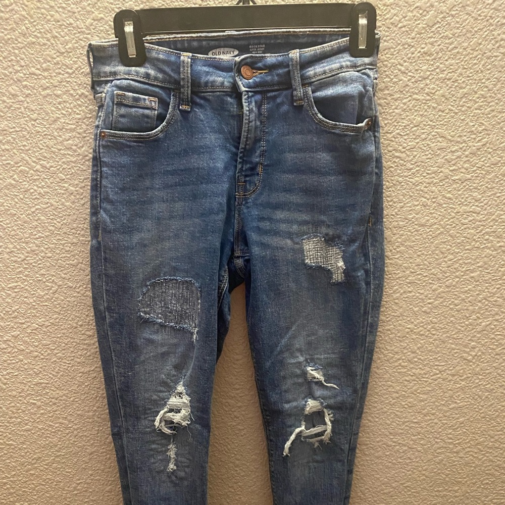 distressed jeans w patterns on the distress